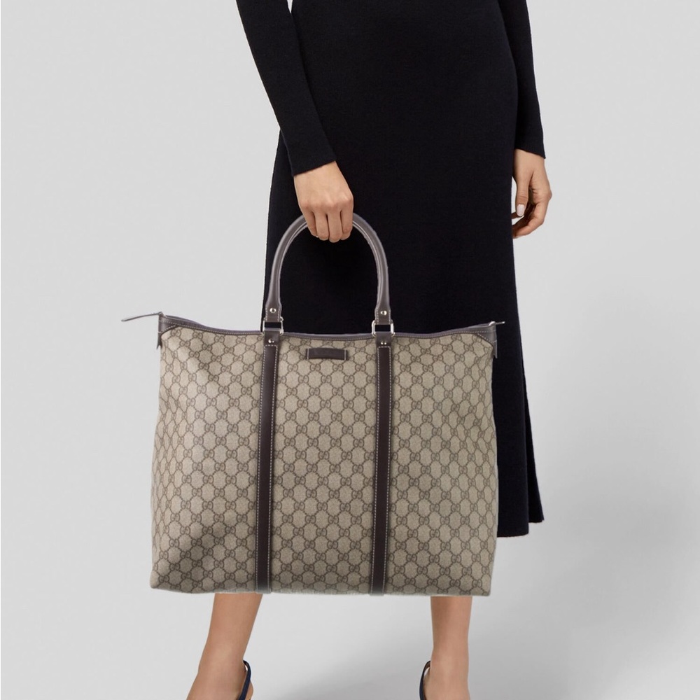 Gently used Gucci supreme tote with dust bag